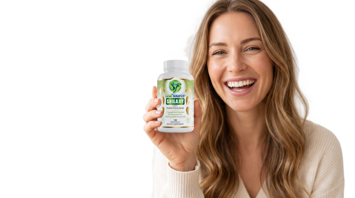 Woman holding LeafSource Shilajit 120 veggie capsules USA bottle